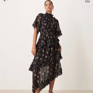 Sister Jane: Smocked Ruffle Asymmetrical Black Floral Midi Dress